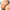 Using the FlexSeries® Shaving Kit by Freebird, a man expertly shaves the side of his head near the ear with ease and precision. The ScalpSafe Technology ensures a smooth, dry shave while the blurred background emphasizes his concentration and skill.