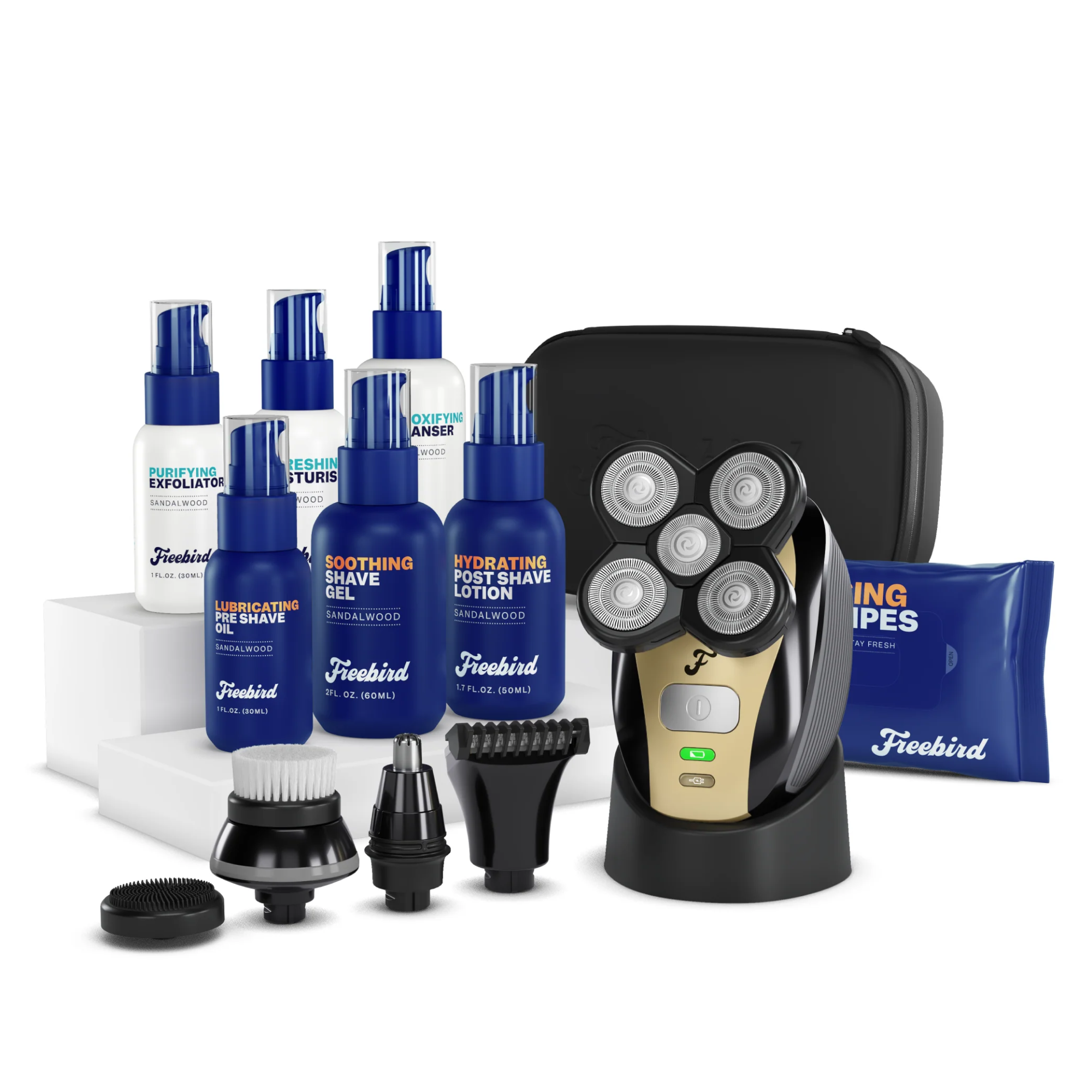 The Perfect Head Kit by Freebird includes razors, lotions, an exfoliator, cleanser, moisturizer, and wipes set against a white background for a fresh clean feeling.