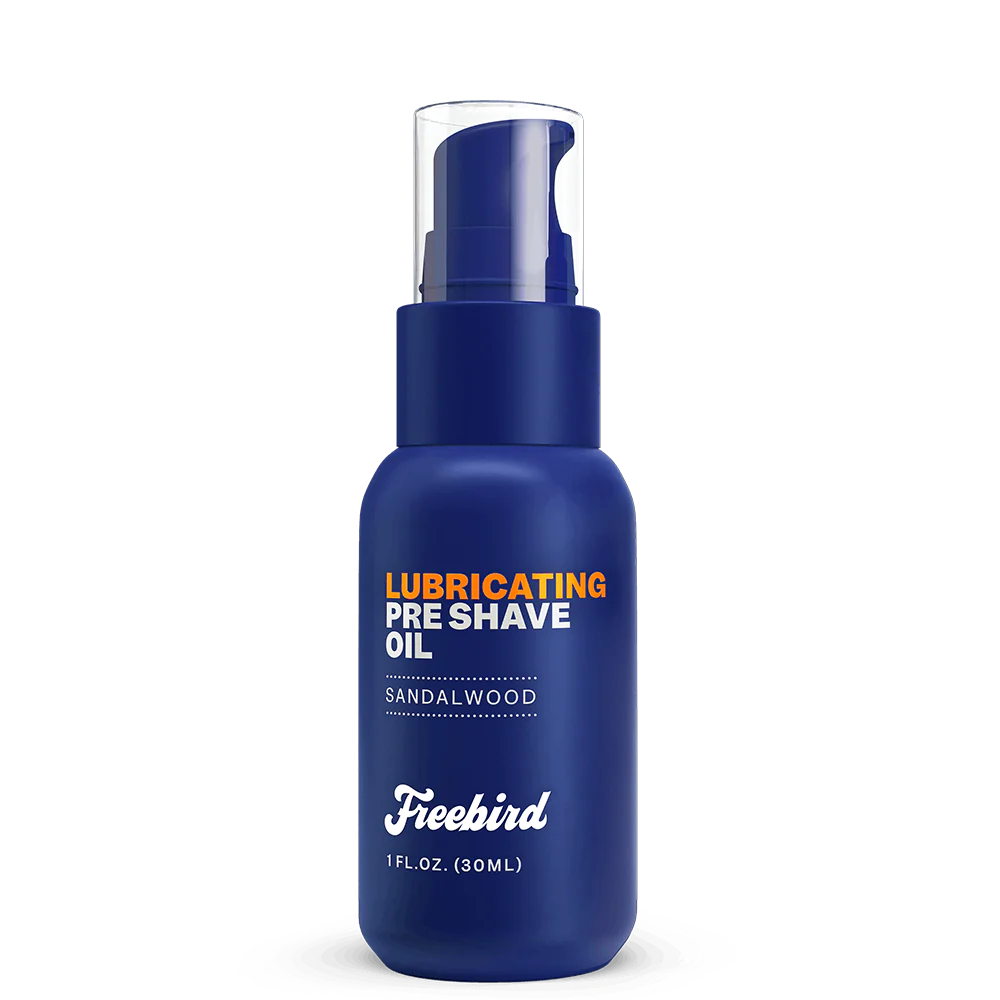 Blue bottle of Freebird Lubricating Pre Shave Oil in Sandalwood scent, 1 fl. oz. capacity.