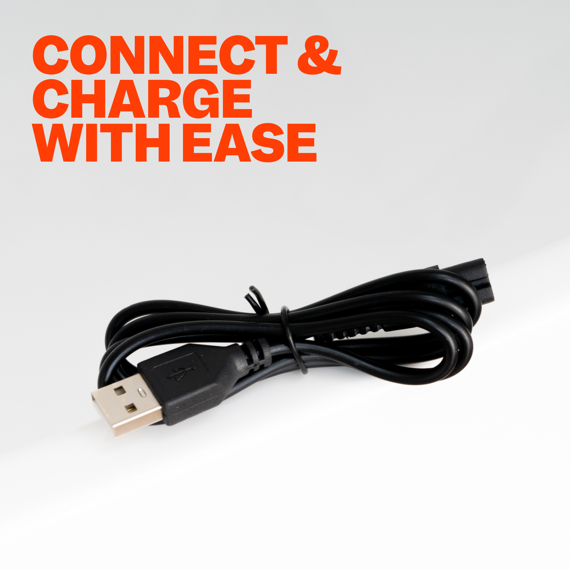 A black Freebird FlexSeries® USB Charging Cable with “CONNECT & CHARGE WITH EASE” in bold orange text above it.