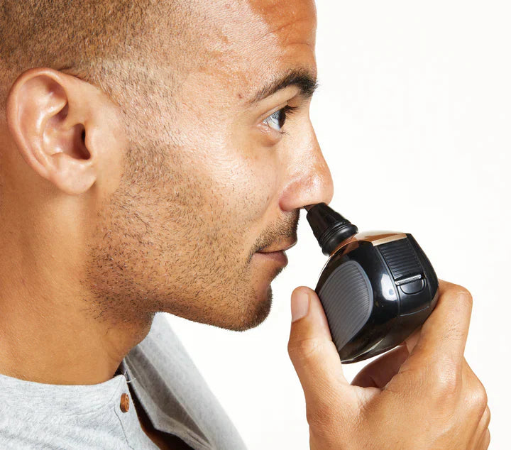 Man using the Freebird FlexSeries® Shaving Kit with ScalpSafe™ Technology for a smooth shave against a plain background.