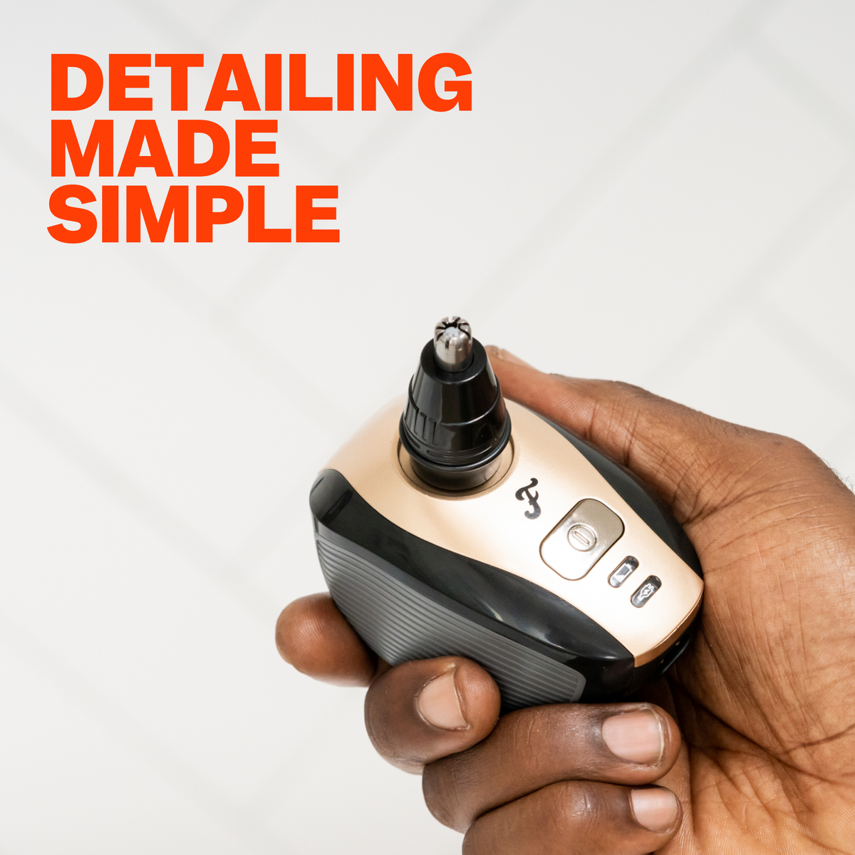 A hand holding a Nose & Ear Hair Trimmer with the text 