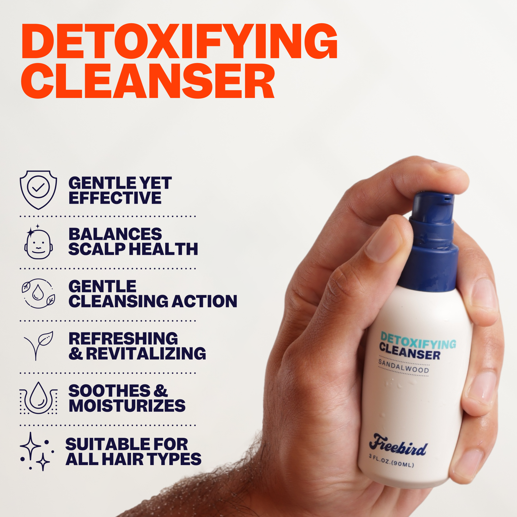 A hand holding a bottle labeled Shave & Scalp Care Kit by Freebird, highlighting the premium headcare product crafted for the smoothest scalp experience.